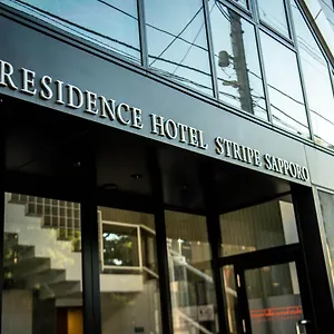 Stripe Apartahotel
